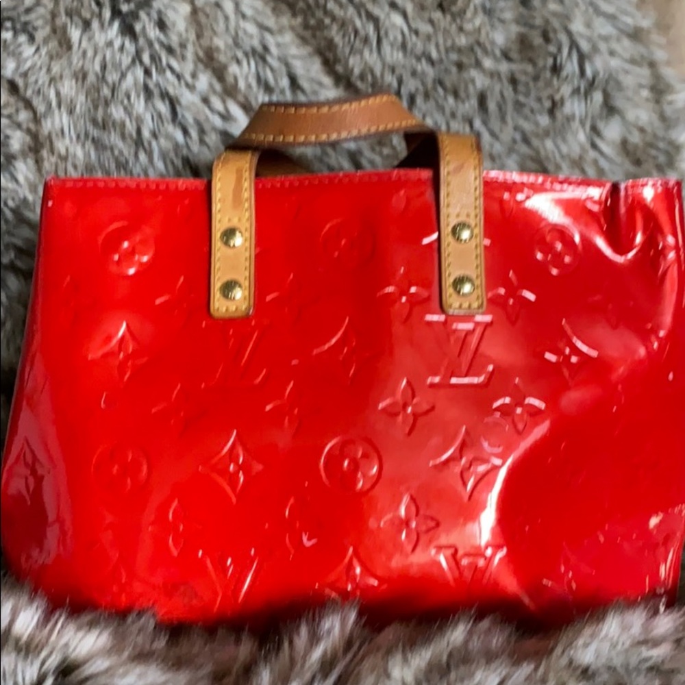 Red Louis Vuitton purse